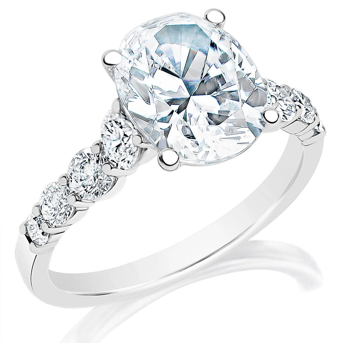 Oval Diamond Round Diamond Graduated Shank Engagement Ring